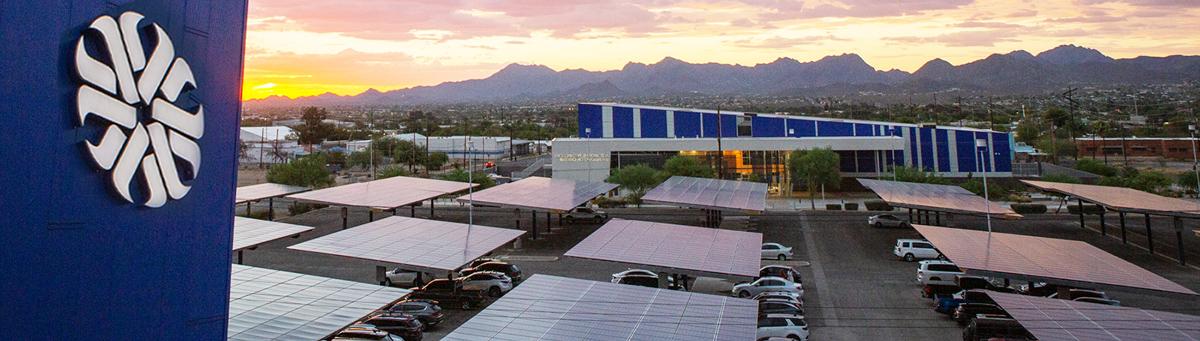 A sunset shot from Downtown campus over looking the parking lot